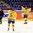 MALMO, SWEDEN - MARCH 28: Sweden's Erika Grahm #24 celebrates a first period goal against Japan with Johanna Fallman #5 while Hanae Kubo #21 looks on during preliminary round action at the 2015 IIHF Ice Hockey Women's World Championship. (Photo by Andre Ringuette/HHOF-IIHF Images)

